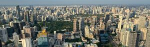 Panoramic skyline of Bangkok showing residential and commercial properties subject to the Land and Building Tax Thailand.