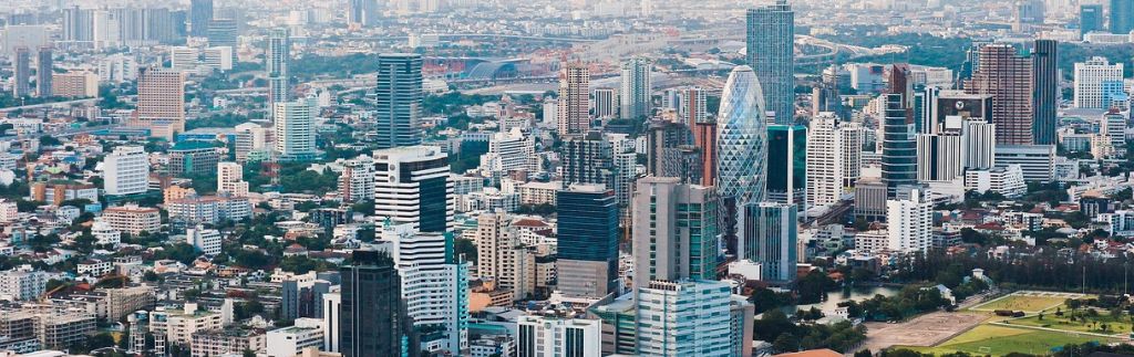 Skyline of Bangkok illustrating Investing Thailand opportunities in real estate, business, and finance.