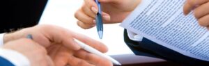 Business professionals reviewing documents related to BOI approval Thailand