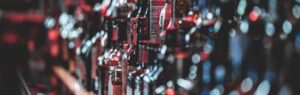 Row of liquor bottles in a bar illustrating thailand drinking age regulations
