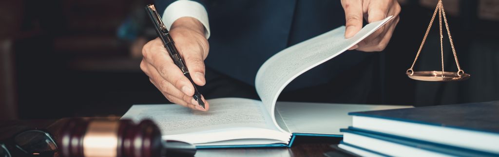 Lawyer reviewing legal documents about the age of consent in Thailand
