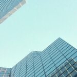 Modern office buildings symbolising the legal and administrative process involved in the dissolution of a company in Thailand