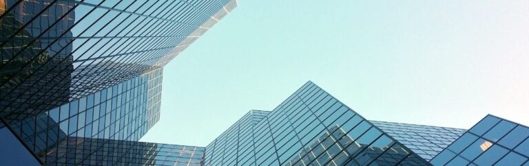 Modern office buildings symbolising the legal and administrative process involved in the dissolution of a company in Thailand