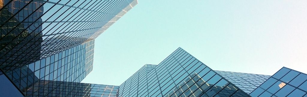 Modern office buildings symbolising the legal and administrative process involved in the dissolution of a company in Thailand